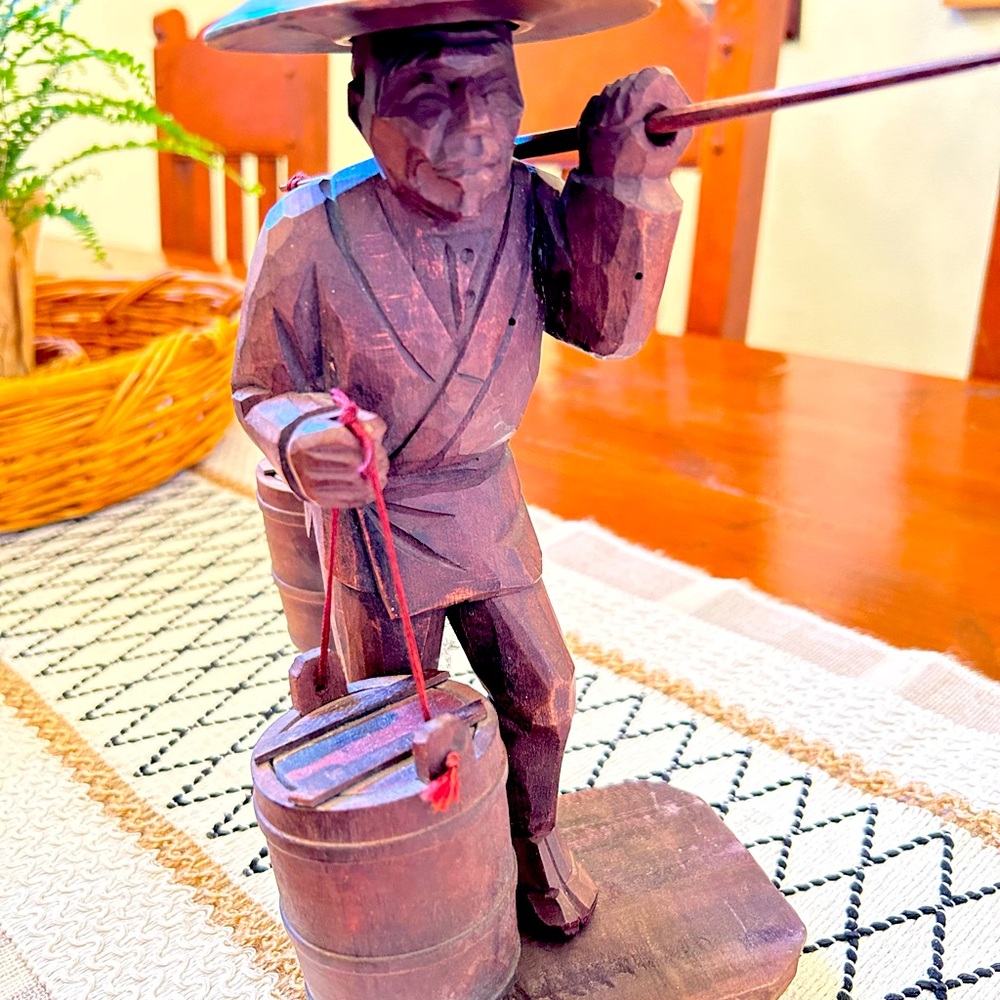 Vintage hand carved Japanese man carrying water buckets